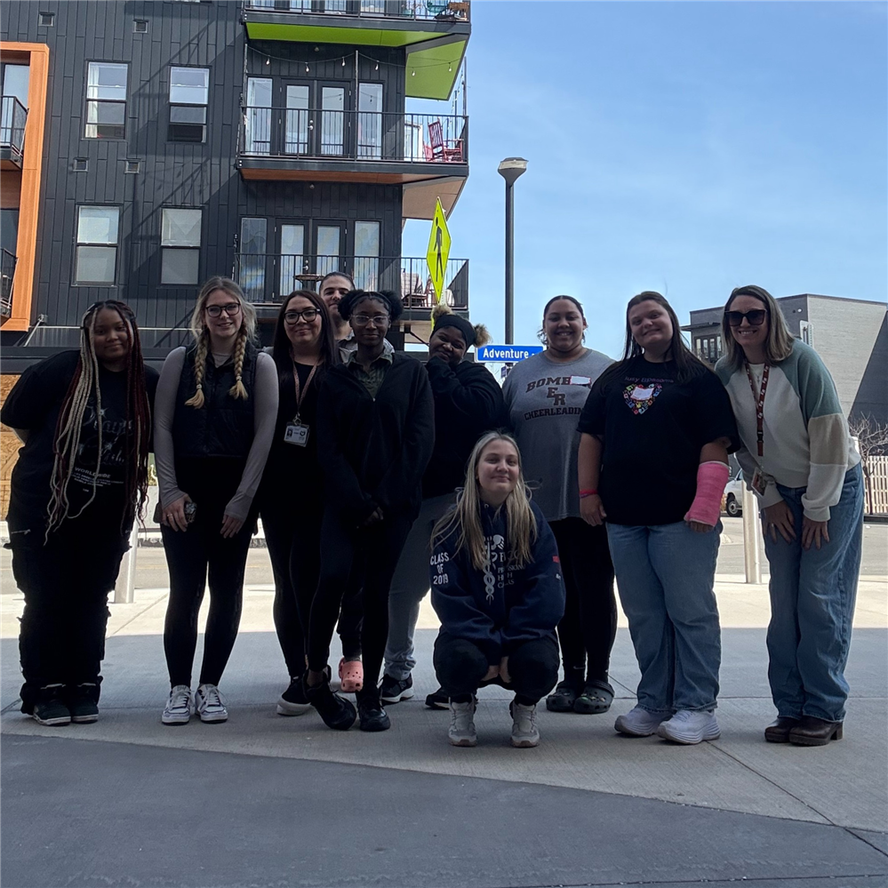  group of EMCC students smiling outside of Strong Museum of Play